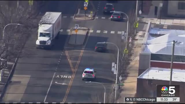 Driver plows through gate in HIGH-SPEED police chase on Chicago's South Side