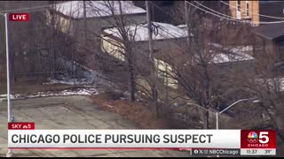 Driver plows through gate in HIGH-SPEED police chase on Chicago's South Side
