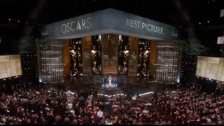 ONE BATTLE AFTER ANOTHER Accepts the Oscar for Best Picture