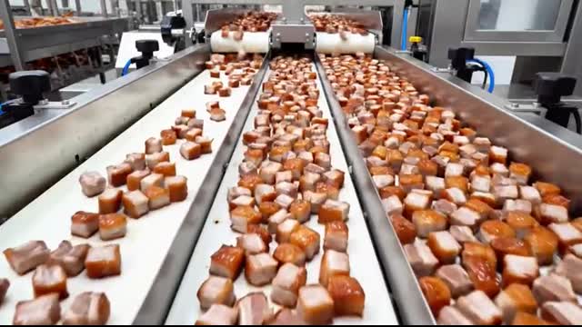 How a Factory Makes Thousands of Cans of Roast Pork Every Day