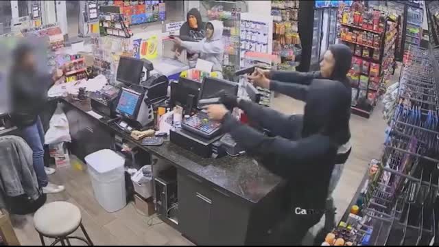 Clerk bombarded by 4 gunmen during robbery at SW Houston gas station, video shows