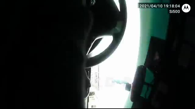 Two police officers stop the head of Internal Affairs