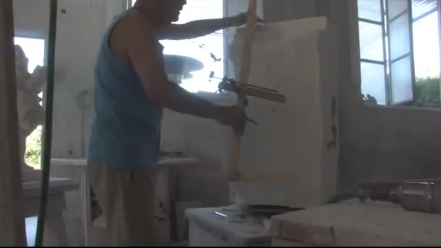 Frilli Gallery The carving of a marble block Putto Cecioni