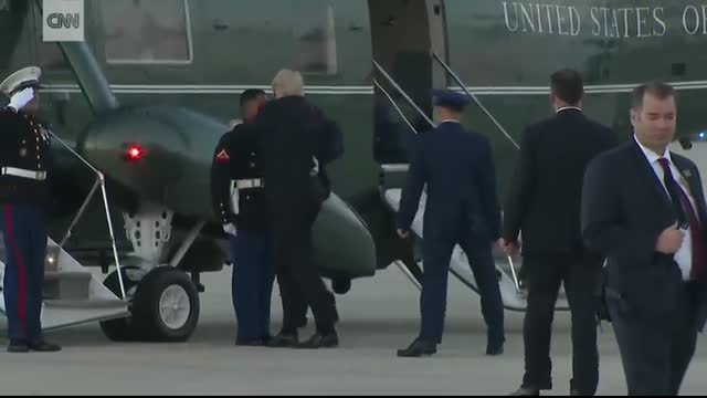 Trump stops to retrieve Marine's hat
