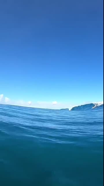 THIS IS NOT A WAVE BUT THE ENTIRE OCEAN FOLDING OVER